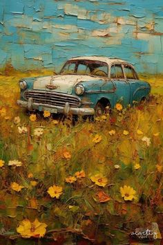 an old car is sitting in a field of flowers