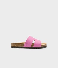 cork sandal with an H-shaped cutout in Magenta pink nubuck leather, suede footbed and brown EVA outersole Modern Open Toe Footbed Sandals With Leather Sole, Modern Footbed Sandals With Leather Sole For Spring, Cork Sandals For Spring Vacation, Beach Cork Open Toe Sandals, Spring Vacation Cork Sandals, Summer Cork Footbed Sandals With Open Toe, Modern Summer Clogs With Textured Footbed, Summer Open Toe Cork Footbed Sandals, Open Toe Cork Sandals For Vacation