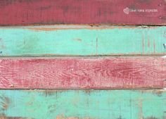 an old wooden wall painted in different colors