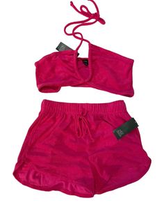 This Pink Terry Cloth Outfit is a must-have for any fashion-forward woman. The set includes shorts and a halter top with tie closure with multiple ways to wear. They both are made of lightweight and breathable materials like polyester, rayon, and cotton. The high waist shorts feature pockets while the halter top has accents like a solid pattern and a Y2k barbie theme. Perfect for summer, this outfit is ideal for a variety of occasions, from casual outings to parties and cocktails. The easy care, non-iron, and stretch features make this outfit convenient to wear and maintain. Get ready to turn heads and make a statement in this stylish and comfortable outfit. So cute. I bought this year and never had a chance to wear. If more photos needed please ask. Fast shipping. Terry Cloth Outfit, Y2k Barbie, Outfit Shorts, Cheeky Shorts, Barbie Theme, Mom Denim, Comfortable Outfit, Gingham Shorts, High Waist Shorts