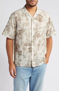 Ready for your packing list, this cotton shirt features a muted print of swaying palms and fresh flowers. 27 1/4" length; 42" chest length (size Medium) Front button closure Notched collar Short sleeves 100% cotton Machine wash, line dry Imported Beige Printed Shirt With Relaxed Fit, Classic Cotton Hawaiian Shirt For Summer, Collared Cotton Shirt With Hibiscus Print, Cotton Hibiscus Print Collared Shirt, Cotton Collared Shirt With Hibiscus Print, Classic Relaxed Fit Hawaiian Cotton Shirt, Classic Relaxed Fit Cotton Hawaiian Shirt, Short Sleeve Linen Shirt With Floral Print, Relaxed Fit Palm Tree Print Shirt For Spring