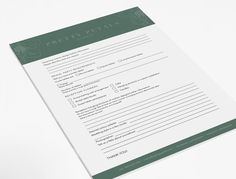 a green and white checklist on top of a table