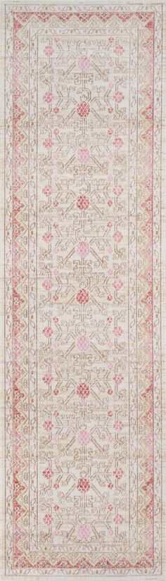 an antique rug with pink and beige colors on the ground, in front of a white background