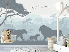 a child's room with animals and trees painted on the wall, including a swing