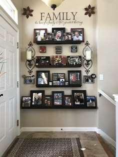 the family wall is filled with pictures and frames