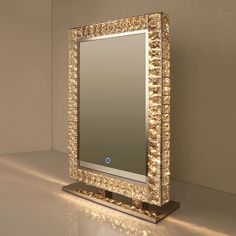 a mirror that is sitting on top of a table