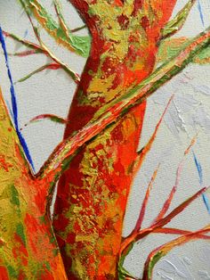 an abstract painting of a tree with red and green leaves on it's trunk