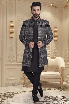 Introducing our exclusive U2-S340 Mens Sherwani. Crafted with the finest thread embroidery, this open jacket exudes sophistication and luxury. Elevate your style and capture attention with this tasteful and elegant piece. Add it to your wardrobe and make a statement at any event. Designer Sherwani For Reception In Winter, Designer Winter Sherwani For Reception, Designer Winter Reception Sherwani, Designer Bandhgala For Winter Reception, Designer Winter Bandhgala For Reception, Designer Sherwani With Intricate Embroidery For Winter, Designer Winter Sherwani With Intricate Embroidery, Elegant Outerwear With Chikankari Embroidery For Eid, Winter Sherwani For Reception With Long Sleeves