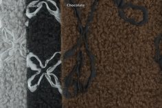 three different colors of carpet with black, white and brown trimmings on them