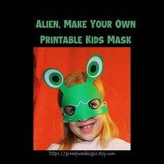 a girl wearing a green frog mask with the words alien make your own printable kids's mask