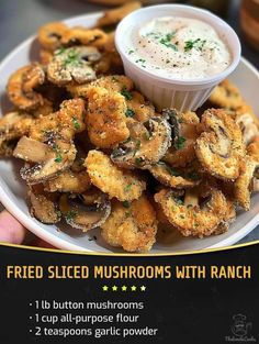 fried mushrooms with ranch dip on a plate