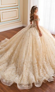 Off-the-shoulder quinceanera dress with a corset bodice and lace embroidery. 15 Dresses Quinceanera Gold, Yellow Quince, Gold Ball Gown, Gold Corset, Quinceanera Dresses Gold, 15 Dresses Quinceanera, Dress With Corset, Quince Dress, Dresses Quinceanera