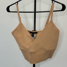 Brand New With Original Tags Attached Never Worn Knit Top With Adjustable Straps Stretchy Material Ribbed Overlapping Design On Front Beige Stretch Knit Crop Top, Beige Ribbed Knit Crop Top, Casual Brown Knit Crop Top, Fall Seamless Knit Crop Top, Fall Season Seamless Knit Crop Top, Brown Knit Crop Top For Spring, Casual Knit Crop Top For Night Out, Trendy Beige Forever 21 Top, Brown Fitted Knit Crop Top