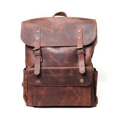 Dark brown leather backpack Luxury Brown Backpack For School, Luxury Brown School Backpack, Classic Brown Backpack With Adjustable Strap, Brown Soft Leather Backpack For School, Classic Brown Leather Satchel Backpack, Brown Soft Leather School Backpack, Classic Brown Rectangular Backpack, Classic Brown Soft Leather Backpack, Luxury Brown Backpack With Leather Backing