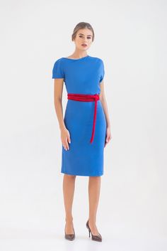 "A beautiful cobalt blue dress is featuring an asymmetrical design, pencil silhouette, and a midi length. - fitted pencil silhouette - asymmetrical blouson bodice - short cap sleeves - midi (knee length) skirt - concealed side seam closure - velvet belt included (you may choose red or black) Fiber: 55% viscose, 40% polyester, 5% elastane Color: cobalt blue For size S: length- 40,5\" (101 cm) Our model wears size S (US 8) and is 171cm/5'6\" tall. You may feel free choosing the size. Just send us Royal Blue Knee-length Midi Dress, Fitted Royal Blue Bodycon Dress, Fitted Royal Blue Knee-length Dress, Fitted Royal Blue Midi Dress, Chic Fitted Royal Blue Midi Dress, Royal Blue Fitted Chic Midi Dress, Royal Blue Fitted Midi Dress For Formal Occasions, Royal Blue Short Sleeve Midi Dress For Party, Formal Fitted Royal Blue Midi Dress