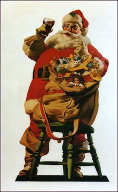 a santa clause sitting on top of a stool holding a wine glass in his hand