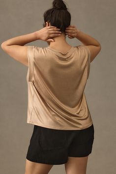 Polyester, elastane Pullover styling Hand wash Imported | Shine Muscle T-Shirt by Porridge in Gold, Women's, Size: XL, Polyester/Elastane at Anthropologie Versatile Stretch Tops For Loungewear, Stretch Tops For Loungewear, Chic Stretch Muscle Tee With Crew Neck, Stretch Modal T-shirt For Summer, Fitted Crew Neck Top For Loungewear, Athleisure Tops With Minimal Stretch For Loungewear, Versatile Crew Neck Top For Loungewear, Stretch Crew Neck Knit Top For Loungewear, Chic Stretch Tops For Loungewear