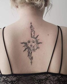 a woman with a sun tattoo on her back