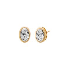 Introducing the Adina Eden Lab Grown Diamond Oval Bezel Stud Earrings, a stunning and elegant addition to your jewelry collection. Crafted from a blend of 14K gold and 14K white gold, these earrings feature a single oval brilliant-cut lab-grown diamond in each stud. With a color grade of G and clarity of VS1, these diamonds offer exceptional brilliance and purity. Available in five carat sizes—0.25 CT, 0.5 CT, 1 CT, 1.5 CT, and 2 CT—these earrings cater to various style preferences. Secured with Diamond Anklet, Bold Rings, Gold Cocktail Ring, Anklet Bracelet, Charm Bangle, Bezel Diamond, Oval Diamond, Diamond Bracelets, Chain Pendants