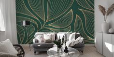 a living room with green and gold wallpaper