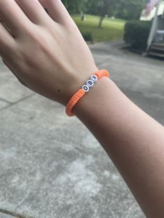 A clay bead bracelet with two different shades of orange and OBX(outer banks) in the middle. Outer Banks Bracelets, Different Shades Of Orange, Obx Outer Banks, Outer Banks Style, Clay Bead Bracelet, Clay Bead, Shades Of Orange, Jewelry Inspo, Outer Banks