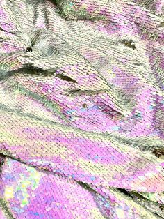 sequins are covering the surface of a cloth