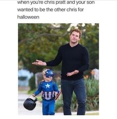 a man walking next to a little boy wearing a captain america costume