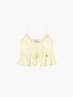 This is a trendy and feminine bustier by PINK PINEAPPLE that is made out of high quality and sturdy material. With casual mood of the design and clean look, it will give a trendy touch to your comfortable daily outfit.- Sturdy cotton 100% fabric- Frill detail on the waist and A line hem- PPA rose gold metal ornament detail Feminine Cotton Crop Top, Chic Cotton Cami Tank Top, Chic Cotton Crop Top With Ruffles, Spring Chic Cotton Crop Top, Chic Spring Cotton Crop Top, Chic Cotton Crop Top For Spring, Trendy Cotton Crop Top With Ruffles, Cotton Ruffle Crop Top, Chic Cotton Crop Top