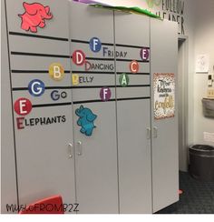 the lockers are decorated with colorful magnets and letters for each student's name