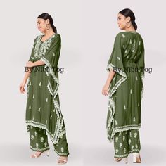 Nibs Tog Ryon Cotton Lucknowi Chikankari Kaftan Dress for Women Green Beautifully crafted with different motifs of Chikankari, well finished with lace work, Presenting you this beautiful Chikankari Kaftan Dress Set with Bottom. Made of Soft ryon Cotton fabric. Check full details below. Shop More Chikankari outfits by Nibs Tog on our Shop : https://www.etsy.com/in-en/shop/NibsTog Fabric: The Kaftan is made of soft Ryon Cotton and it is not transparent fabric. Style: The outfit is style in Kaftan Look with a waist string to adjust. The Set includes one Kaftan and Straight Palazzo Pant with Chikankari Embroidery. Occasion: The Chikankari Kaftan Dress can be styles for any casual day, at home for your comfort or you can carry the Kaftan for Beach Cover Up, It can be Kaftan for Resort Wear and Bohemian Unstitched Palazzo Set With Pallu, Traditional Summer Tunic With Dupatta, Unstitched Floor-length Kaftan For Eid, Festival Palazzo Set With Dupatta And Tunic Top, Embroidered Anarkali Tunic Palazzo Set, Green Chikankari Embroidery Kaftan For Wedding, Anarkali Embroidered Palazzo Set With Tunic, Traditional Summer Kaftan With Dupatta, Green Bohemian Palazzo Set For Navratri