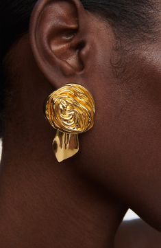 Nature-inspired rosette stud earrings offer bold shine with sculptural blooms and polished leaves finished in 18-karat-gold plate. 1 1/8"W x 1 1/2"L Post back 18k-gold plate Imported African Inspired Earrings, L Post, Suede Jewelry, Timeless Glamour, Gold Vermeil Jewelry, Bold Earrings, Bold Jewelry, Gold Statement Earrings, Earring Post