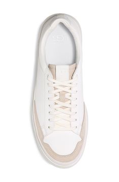 A Treadlite by UGG sole provides lightweight ease in a versatile sneaker with an enerG Comfort System for soft support. Lace-up style Leather and textile upper/textile lining/rubber sole Imported Men's Shoes Casual Cream Sneakers With Removable Insole, White Leather Slip-resistant Sneakers, Slip-resistant Lace-up Sneakers For Spring, Spring Slip-resistant Lace-up Sneakers, Slip-resistant Lace-up Spring Sneakers, White Textile Sneakers With Removable Insole, Spring Leather Slip-resistant Sneakers, Slip-resistant Leather Sneakers For Light Sports, Leather Slip-resistant Sneakers For Light Sports