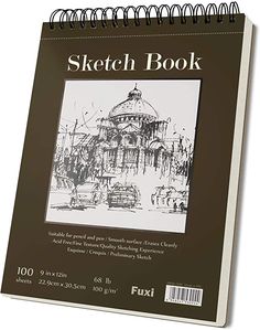 a sketch book with an image of a building