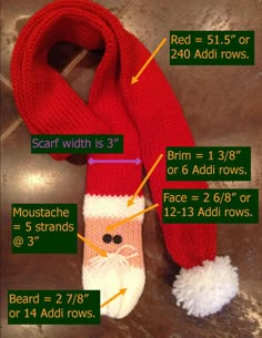 a knitted scarf with instructions on how to sew the santa claus's stocking