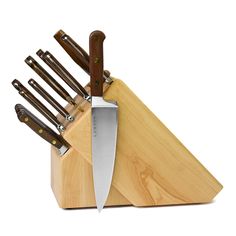 a knife block with several knives in it