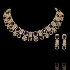 This wear-with-all piece is just perfect for those who love their statement accessories with mixed media flair! Timeless and modern, this hand crafted set dazzle with an elegant frame traced with CZ and sapphire stones. The set includes a necklace and a pair of matching earrings. Approximate earrings length is 1.5". Gold-plated on high-quality brass as base metal. Made by order. Kindly allow 5-7 weeks for the delivery of this item. For custom or urgent requests, please contact support@alacouture Luxury Sapphire Necklaces With Gemstone Beads, Exquisite Sapphire Gemstone Necklace, Luxury Sapphire Necklace With Gemstone Accents, Luxury Gold Lapis Lazuli Beaded Necklace, Luxury Statement Necklace In Lapis Lazuli, Elegant Frame, Craft Set, Sapphire Stone, Base Metal