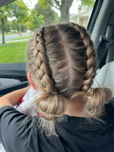 Dutch/french braids into 2 buns hairstyle. short hair friendly easy hairstyle. Perfect for volleyball, basletball, track etc. Braid To Bun Hairstyle Sports, Two Braids Into Two Ponytails, 2 Braid Bun Hairstyles, Cute Dutch Braid Hairstyles Easy, Braiding Boyfriends Hair, 2 French Braids Short Hair, French Braids Into Two Buns, Cute Hairstyles Basketball, Wrestling Hair Styles