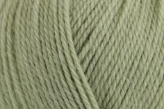 a ball of green yarn on a white background