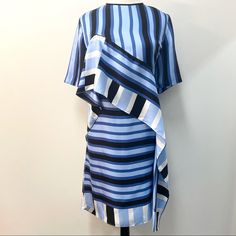 Nwt Diane Von Furstenberg Ruffle Front Mini Dress Saxon Stripe Powder 100% Silk Size 14 Note- Last Photo Shows A Very Slight Fade Mark, Almost Unnoticeable Blue Ruffled Mini Dress For Work, Blue Ruffle Mini Dress For Work, Frayed Dress, Dvf Diane Von Furstenberg, Jersey Wrap Dress, Silk Wrap Dresses, Diane Von Furstenberg Dress, Aqua Dress, Satin Gown