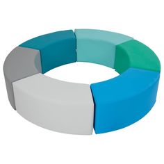 a circular bench made out of different colored blocks