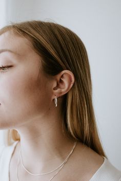 Elevate your everyday look with these stunning 20mm Sterling Silver Hoops—designed for those who appreciate timeless elegance and understated style. These classic hoops add just the right amount of shine without being too bold, making them perfect for both day-to-day wear and special occasions. The Details - Material: 925 Stamped Sterling Silver, known for its durability and lustrous shine that lasts - Size: 20mm, the perfect medium size for a chic yet understated look - Comfort Fit: Lightweight Everyday Silver Huggie Wrap Earrings, Everyday Silver Wrap Earrings, Trendy Silver Wrap Earrings, Trendy Silver Wrap Earrings For Everyday, Trendy Everyday Silver Wrap Earrings, Everyday Hypoallergenic Silver Wrap Earrings, Silver Threader Earrings For Everyday, Everyday Silver Wrap Earrings With Ear Wire, Hypoallergenic Threader Earrings For Everyday Wear