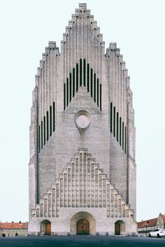 a tall building with a clock on it's side