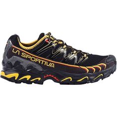 a black and yellow shoe with the word la sportiva written on it's side