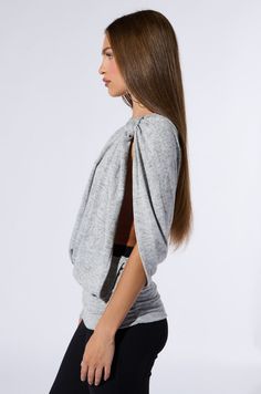 Give basic fall fashion the cold shoulder in The AKIRA Label Mariah Cold Shoulder Sweater. This super soft and stretchy sweater boasts a relaxed, draped vibe and a unique, asymmetrical silhouette — the right side features a long, roomy sleeve while the left is totally sleeveless. The sleeveless side is gathered at the shoulder and opens to the hem where it is gathered and ruched. Style it with a leather jacket and straight leg jeans for a streamlined finish.  - 95% Polyester, 5% Elastane - Super Stretchy- Imported (all measurements approximate from size small) - 30” Shoulder to Hem- 23” Sleeve- Model is 5’9”Product ID: 430730 Sleeve Model, All White Party, White Accessories, Cold Shoulder Sweater, White Party, White Outfits, Shoulder Sweater, Right Side, Fall Fashion