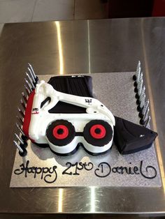 a birthday cake that is shaped like a car