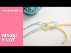 two skeins of yarn with the words magic knot written on them in blue and yellow