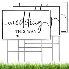 three wedding signs on top of each other in the grass