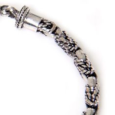 Juxtaposing rich silver textures, Komang Suastra handcrafts a classic design, evoking a sinnet braid with this beautiful bracelet. Sterling silver Borobudur chain S-hook or hook clasp Combination finish 7.5" L (19.1 cm) Handmade in & fairly traded from Indonesia Silver Braided Bracelet, Paw Print Jewelry, Ribbon Jewelry, Kids Bracelets, Printed Jewelry, S Hook, Braided Bracelet, Bracelet Sterling Silver, Men's Rings