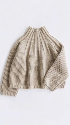 the sweater is knitted and ready to be worn