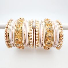 Beautifully designed bangles for any occasion. South asian bracelets come in a variety of styles, colors, and finishes. We at Banglez take creating the perfect bangle set for you to another level! You could say helping you find your favorite stack of bangles as one of our greatest missions. This bangle set was curated in house by one of our talented team members. We hope you love them as much as we do! Pink Bohemian Bangle For Party, Pink Bangles Set, Cheap Pink Traditional Bangle, Peach Bangles Set, Exquisite Hand-set Gold Bangle, Bangle Set, Bangles, Finding Yourself, Beauty